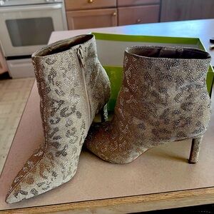 Super cute leopard print high heel boots. Only used ONCE. Pretty much brand new